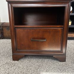 This is a solid wood nightstand/end table in 2010 by Samson International