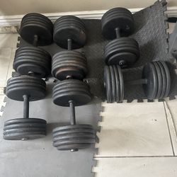 Pairs of 115lbs,95lbs and 85lbs dumbbells weights 590lbs total