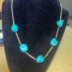 Genuine turquoise stones with a 20 inch silver rope chain selling it for $90
