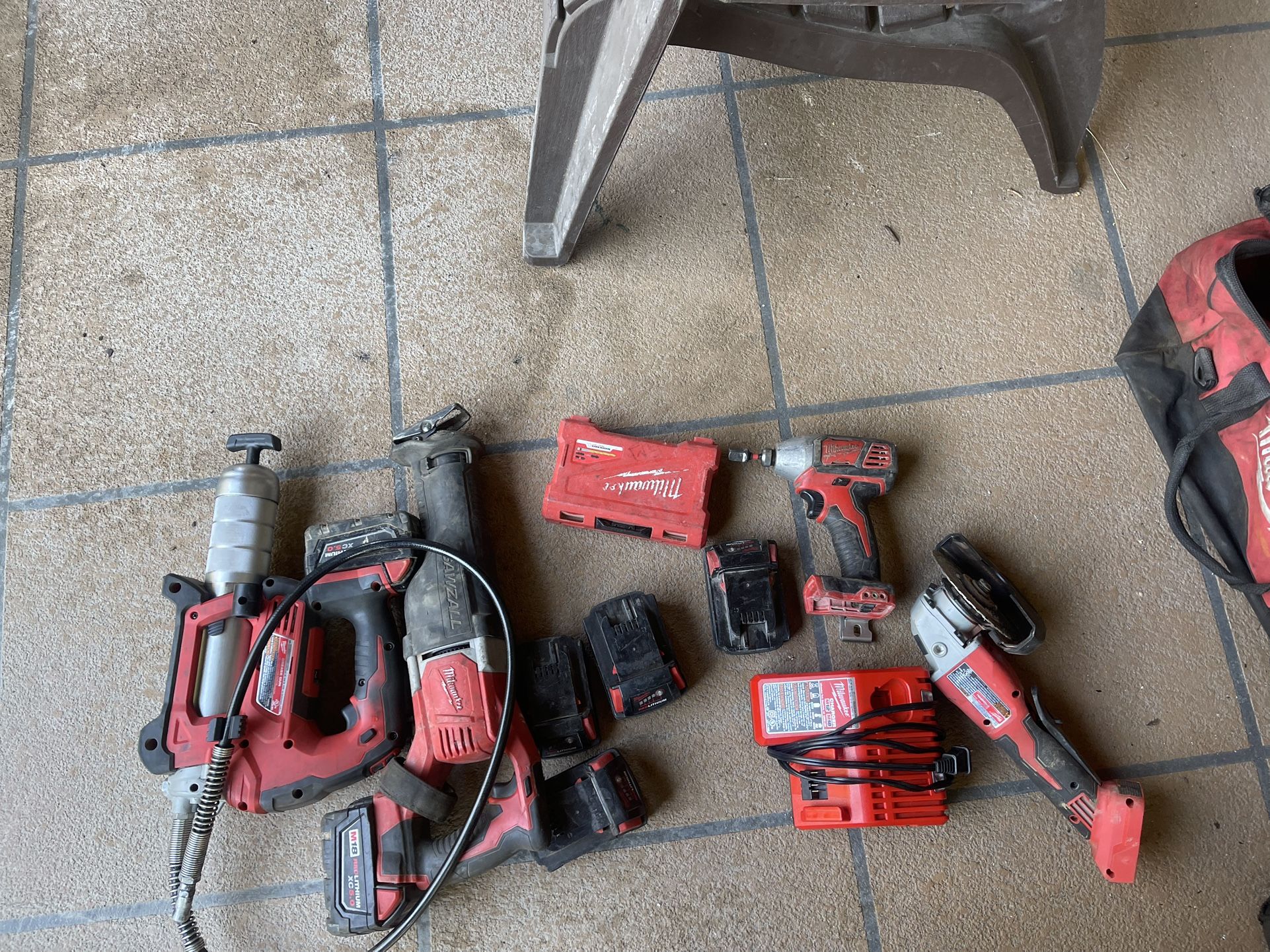Milwaukee Grease Gun, Sawzall,grinder,drill,charger,batteries