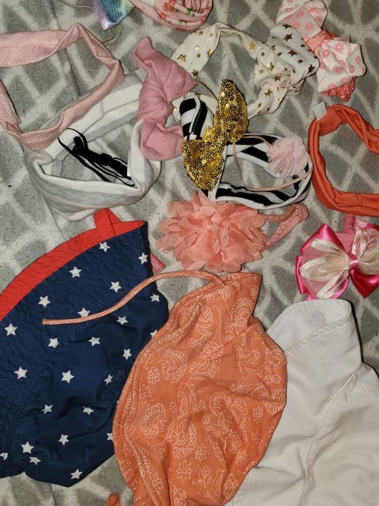 3 hats 6 to 12 months and 13 headbands