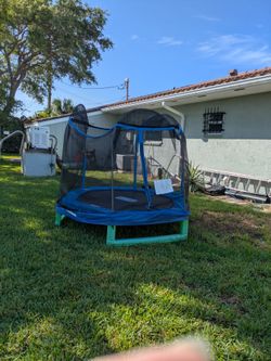 Children's trampoline with net
