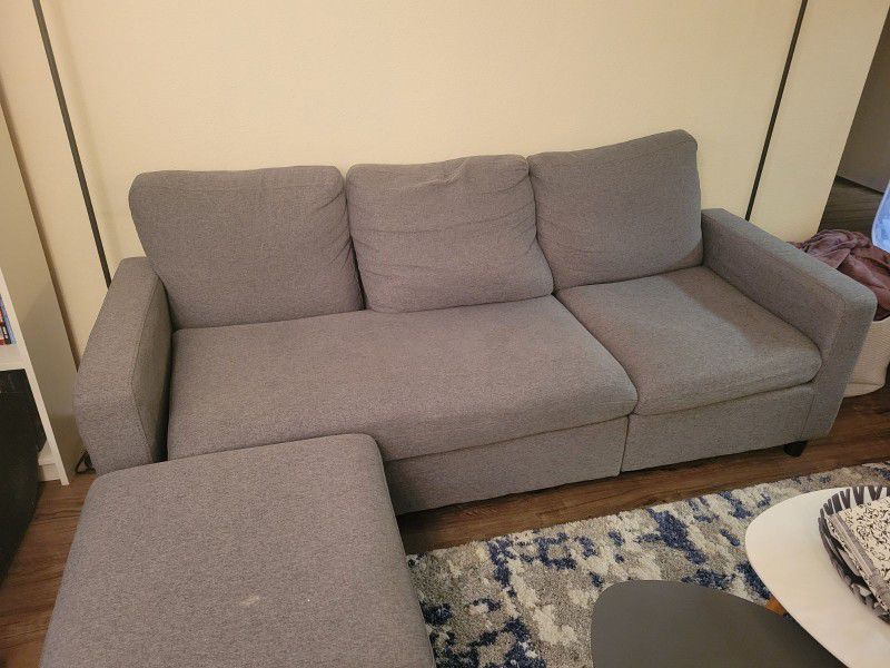 Gray Couch And Ottoman