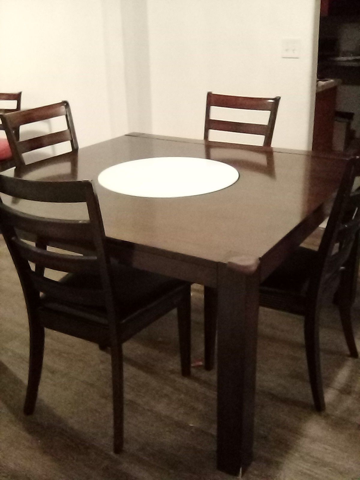 Dining table with built in lazy Susan seats 8 people comes with 4 chairs