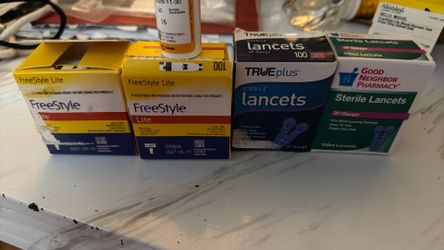 Freestyle lite  test strips and lancets.