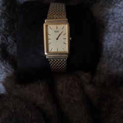 Seiko gold tone tank watch