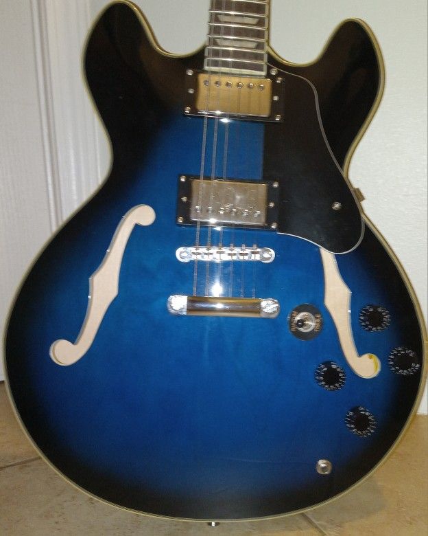 Firefly Electric Guitar Blue And Black. Includes Cable And Fender Strap