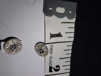 Pierced Round Silver Tone Earrings