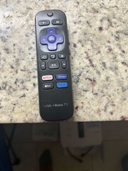 TCL Roku TV Remote Control and air pod pros