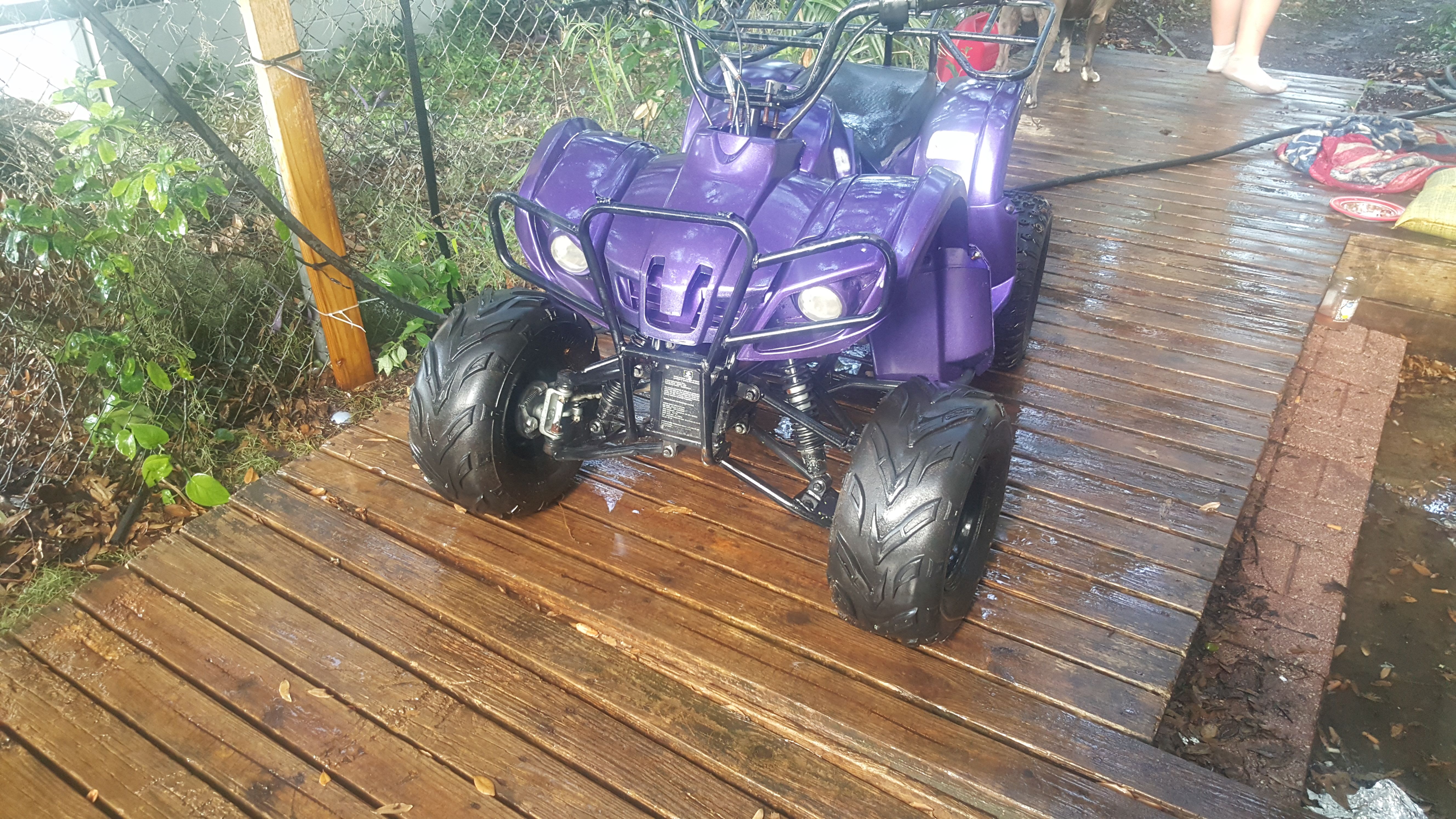 Purple atv(four wheeler)