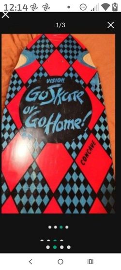 This is a Vision "Go Skate or Go Home" reissue skateboard deck.