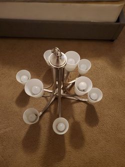 Like new beautiful chandelier. Nickel finish. 9 lights. Sorry to see it go. I moved and cant use it:(150.00 paid 489.00