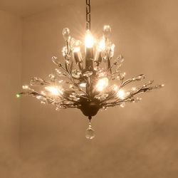 Eftica 30" Modern Firefly Chandelier 7 - Light Dimmable with Hanging Chain. Black Plating. New open box inspected. 20'' H X 30'' W X 30'' D. Chain Len