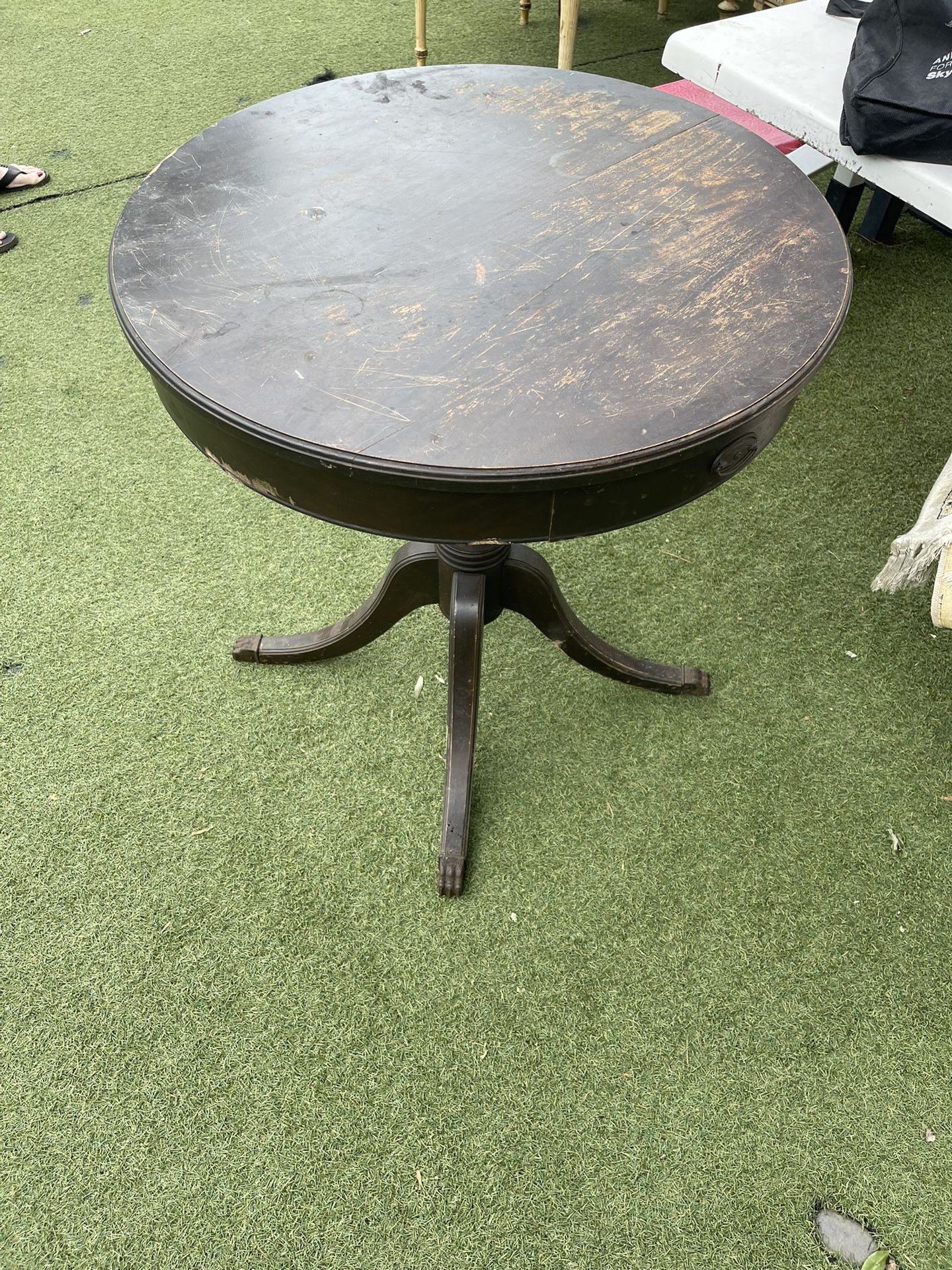 Antique round clawfoot two drawer table hundred dollars