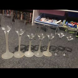 7  Glass Candle Sticks Five of one set and two of another set