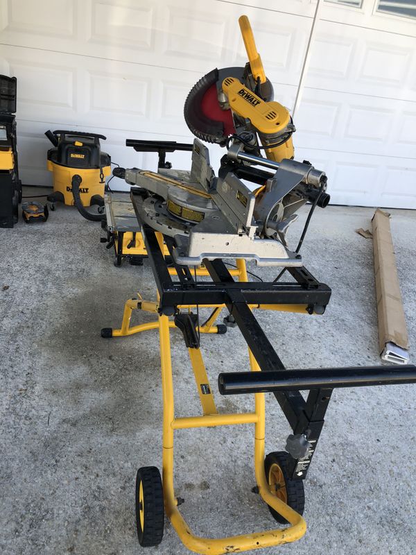 Dewalt miter saw and stand on wheels (no low ballers ) for Sale in Miami, FL OfferUp