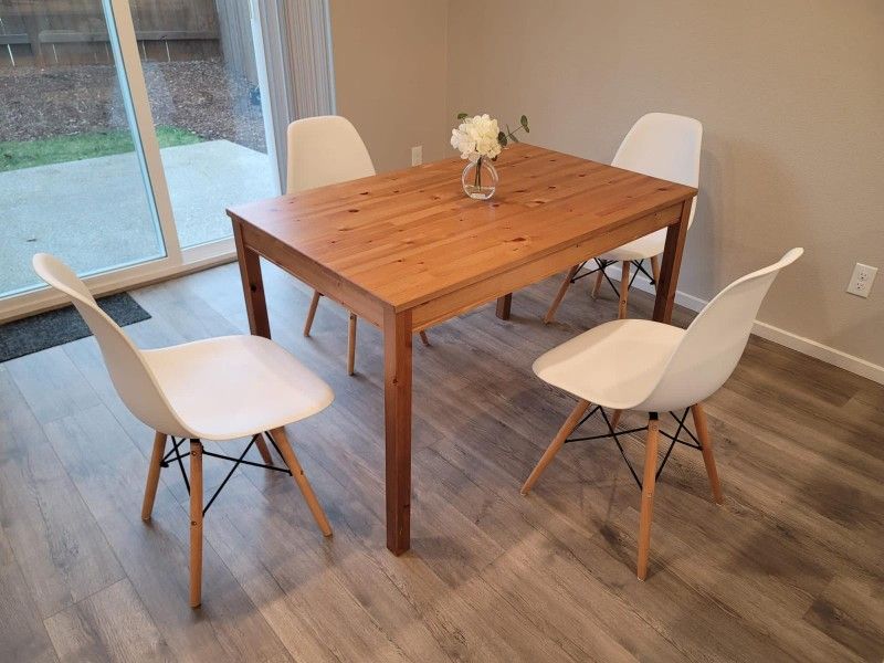 Brown Table and 4 White Chairs