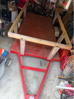 Trailer.   Folds tilts