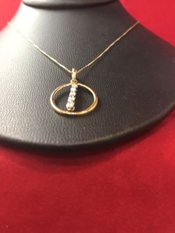 10K Circle of Love with real diamond journey pendant