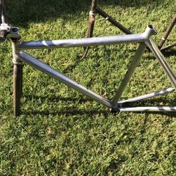alum cannondale  conversion framew/campybb , eddie merx roadbike frame both about 56-58cm , velocity rims alum 700 , bullhorn& cut riser bars.  bars 