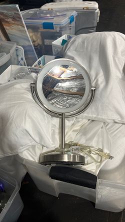 Conair light up mirror. One side is magnifying. Perfect condition