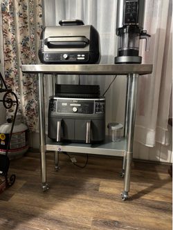 STANLESS STEEL table  $175.00