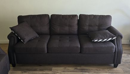 Brown couches and carpet