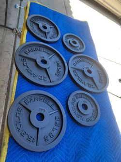 210 lbs Olympic Weights...FREE RACK....NO BARS