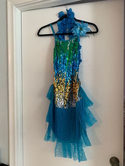 Stunning turquoise sequined dress for performances! 💙 size 8–12 years ✨