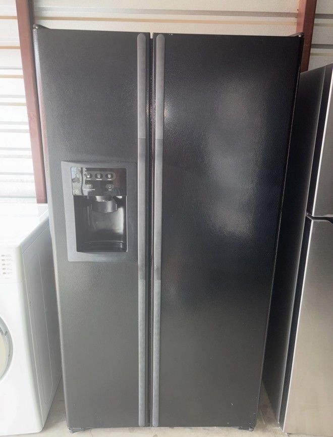 Black GE Refrigerator And Freezer
