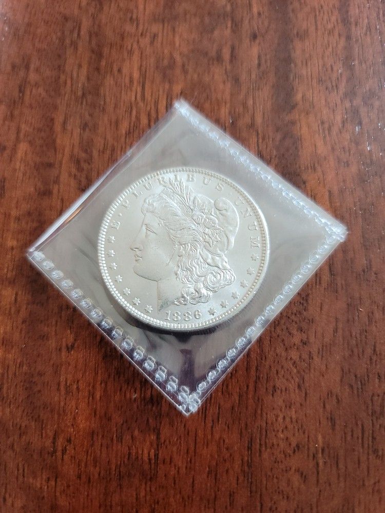 1886 Morgan Silver Dollar In Raw Genuine Mint Condition 