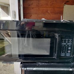 Magic Chef Over The Range Microwave  - Can Deliver