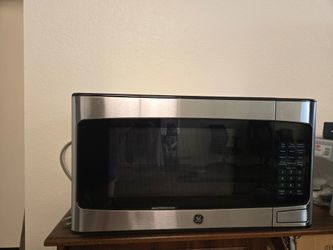 GE MICROWAVE OVEN new