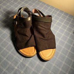 Black blowfish sandals with leather straps. Size 7.5