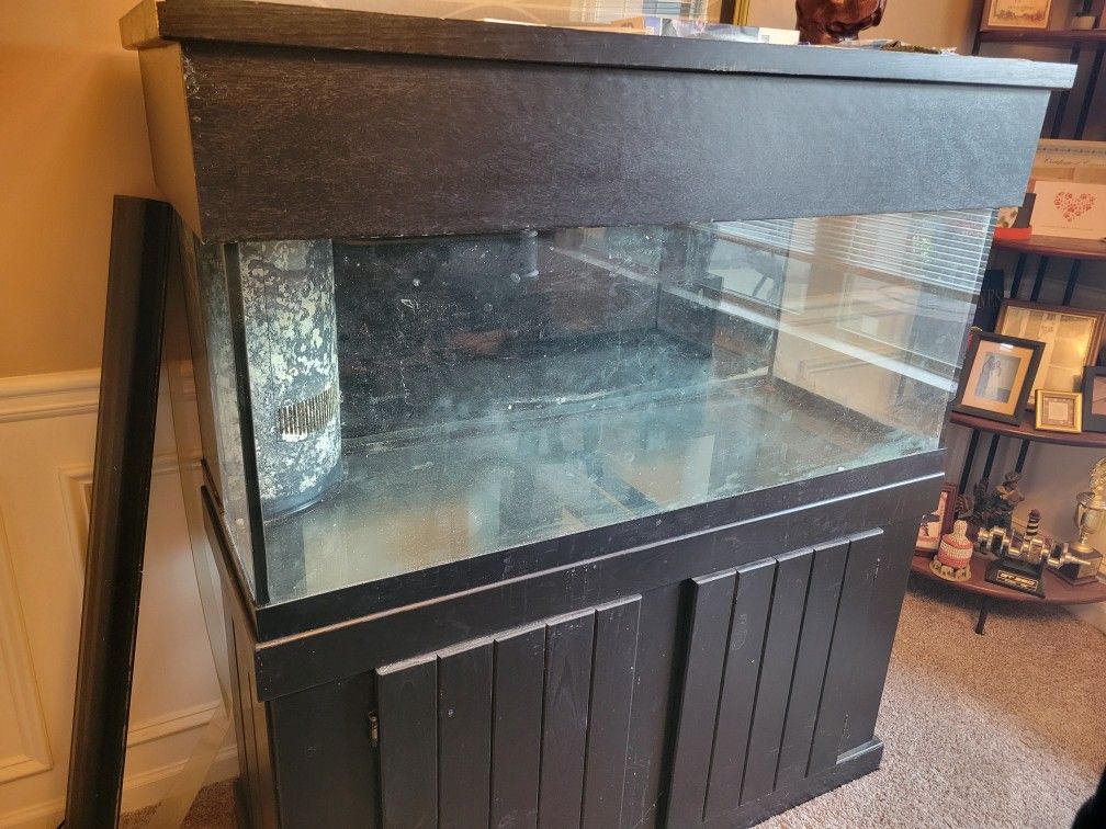 75 Gallon Saltwater Tank w/ Stand And Hood $200.00