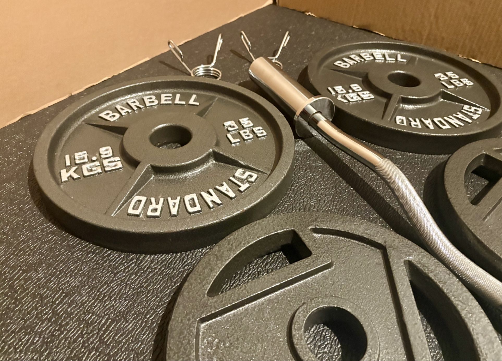 BRAND NEW Olympic Curl Bar With Cast Iron Weight Plates; 35#, 25#, 10#, 5 and 2.5# (170 pounds)