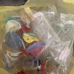 Bag Of Pacifiers And Bottles