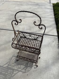 Vintage three tier plant cast irong plant stand patio