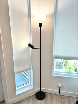 Black floor lamp with two lights, adjustable reading light
