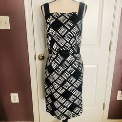 Black and white patterned belted dress. 