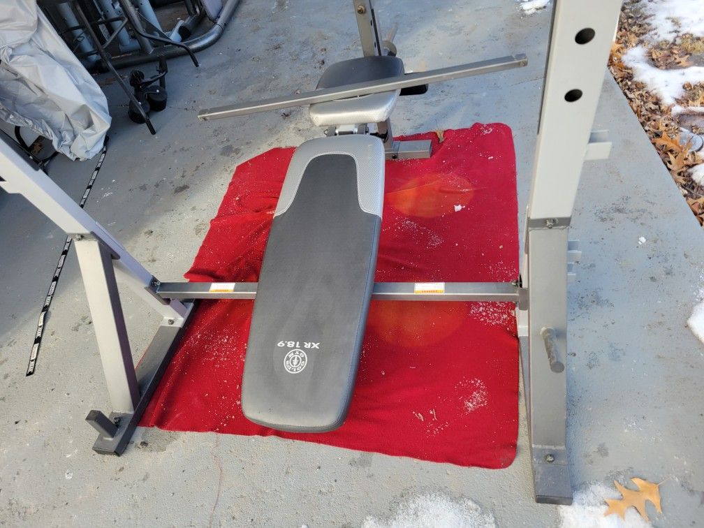 GOLD'S GYM XR 18.9 OLYMPIC BENCH
SQUAT RACK. INCLINE. PREACHER PAD ADJUSTABLE SEAT EXCELLENT CONDITION 11525 S HALSTED DUNKIN/ 7111.S WESTERN WALGRE