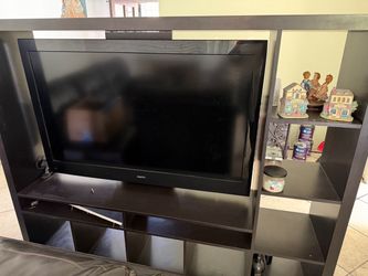 Entertainment center with tv  included all work