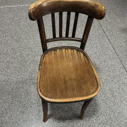 This is an antique bentwood bistro chair/Vintage