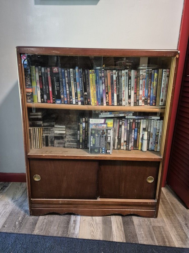 Antique Shelf Full Of Dvds