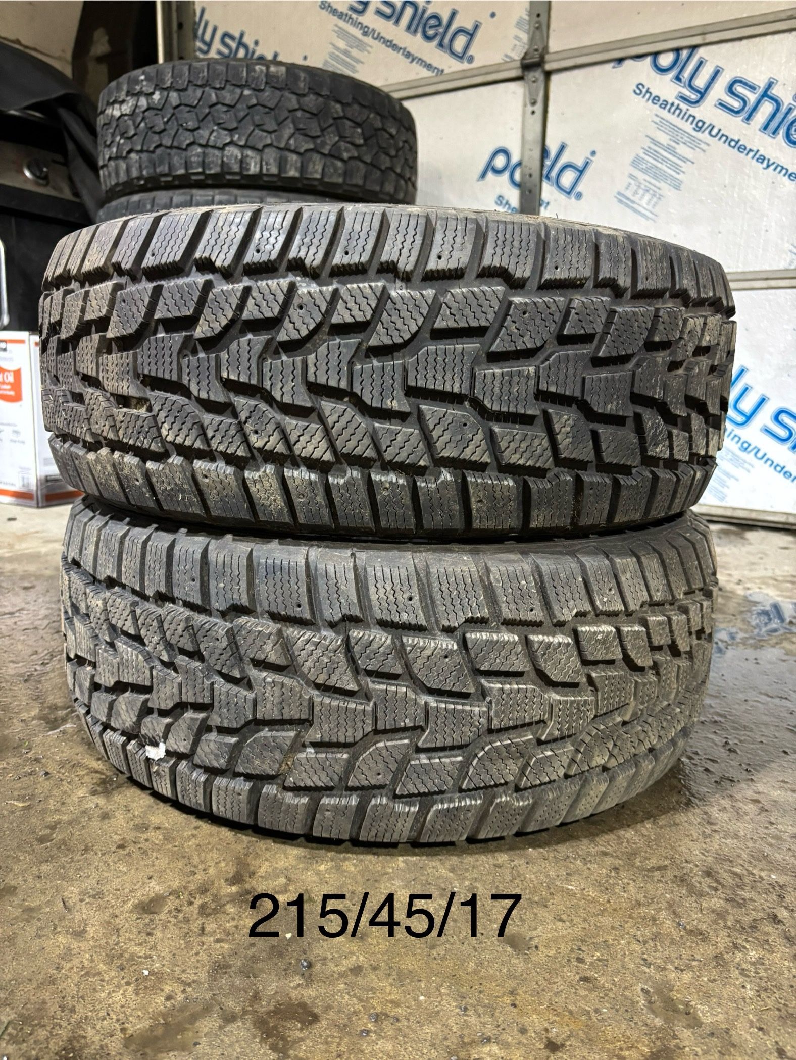 (2) - 215/45/17 Cooper Evolution Winter Tires