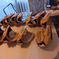 NEW BASEBALL AND SOFTBALL GLOVES  $40 EACH FIRM PRICE 