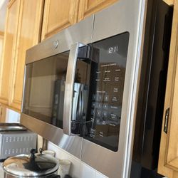 GE Brand New Wall Microwave 
