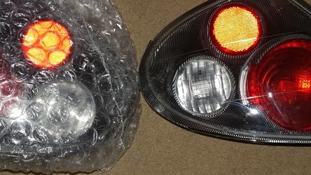 Dodge neon carbon fiber taillights.