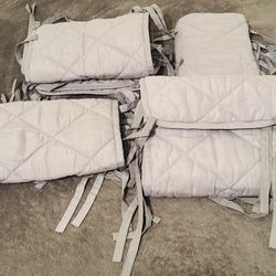 Gray quilted baby crib bumper set