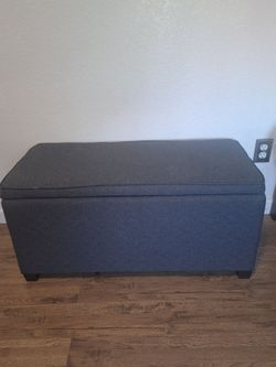 Gray storage ottoman